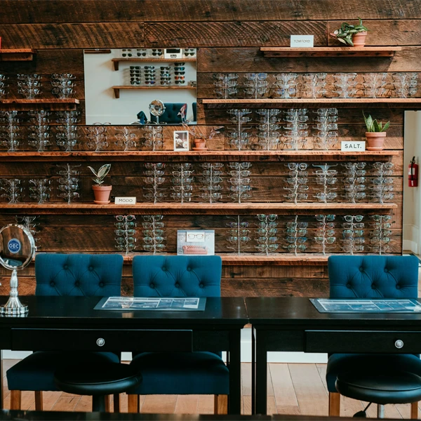 The lobby at Owen Eye Care. There are a variety of frames for patients to choose from.