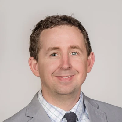 A headshot photo of Dr. Travis Anderson, an eye doctor at Owen Eye Care